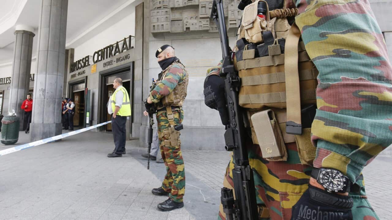 Armed Belgian soldiers outside the Brussels central station