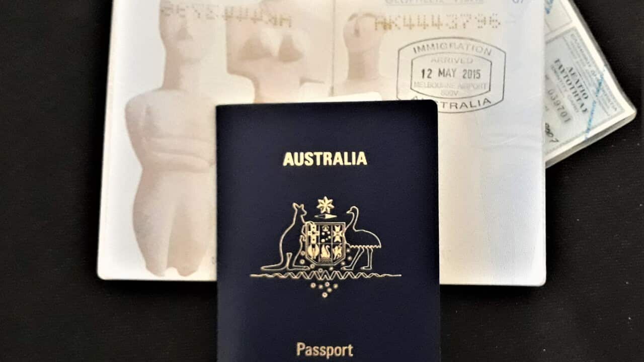 Greek and Australian passports.