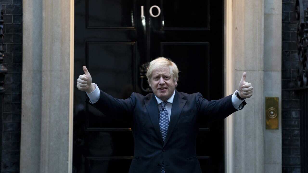 British Prime Minister Boris Johnson takes part during the 'Clap for our Carers' campaign in support of Britain's National Health Service.