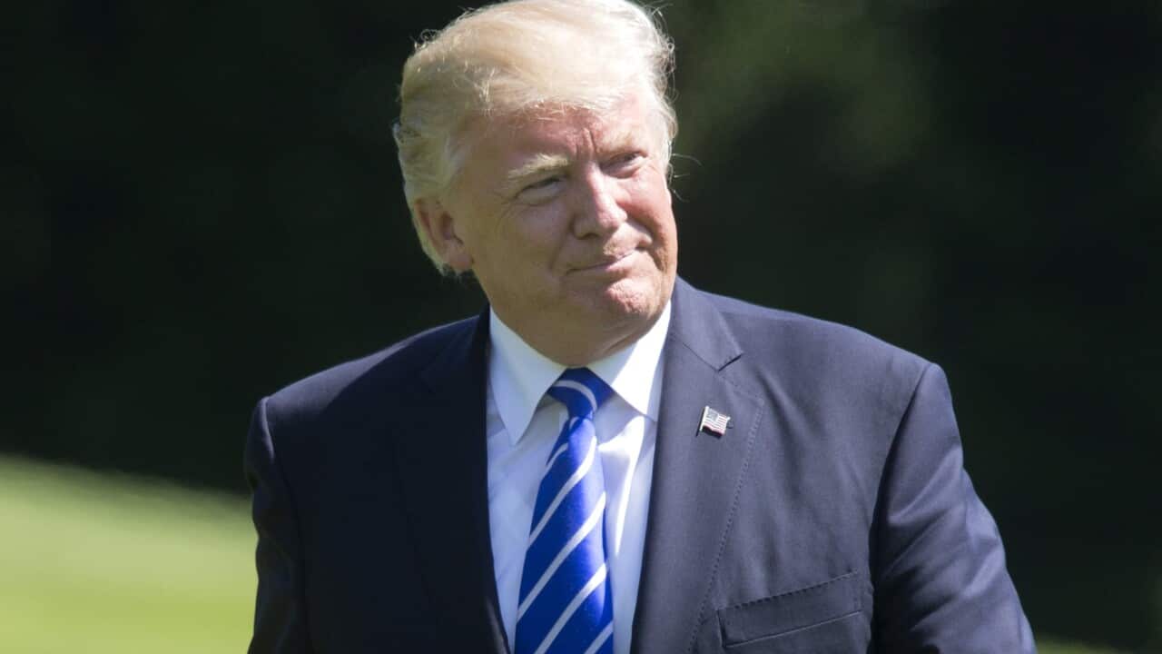 US President Donald Trump walks across the South Lawn of the White House after arriving by Marine One in Washington, DC, USA, 17 May 2017.