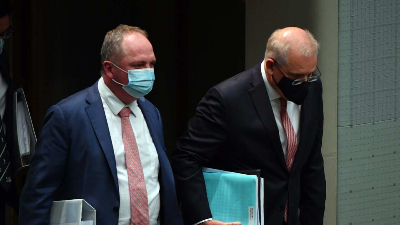Deputy Prime Minister Barnaby Joyce and Prime Minister Scott Morrison arrive for Question Time in Canberra, 25 October, 2021.