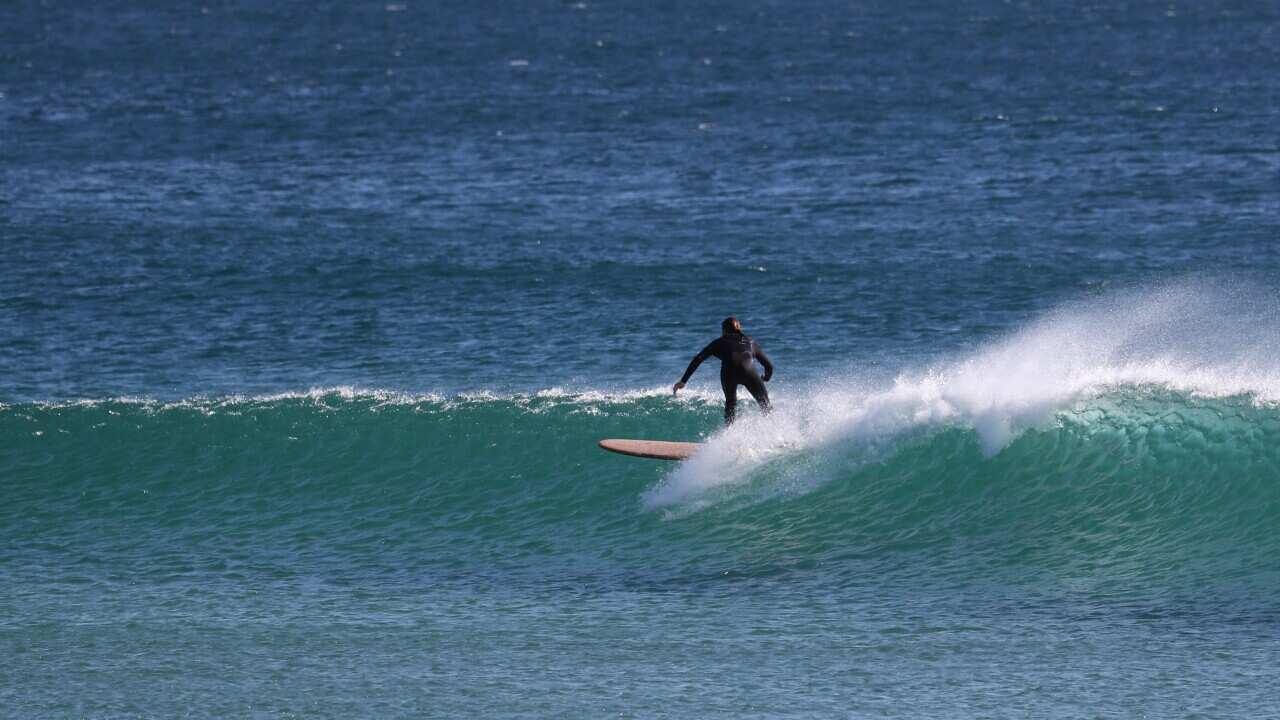 Qld aims to keep border open after Dec 17