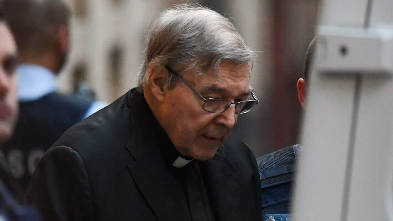Cardinal George Pell leaves the Supreme Court of Victoria in June.
