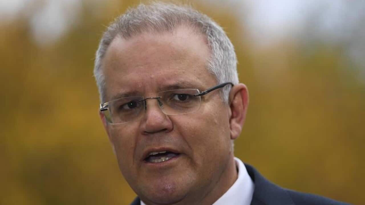 Treasurer Scott Morrison speaks to the media