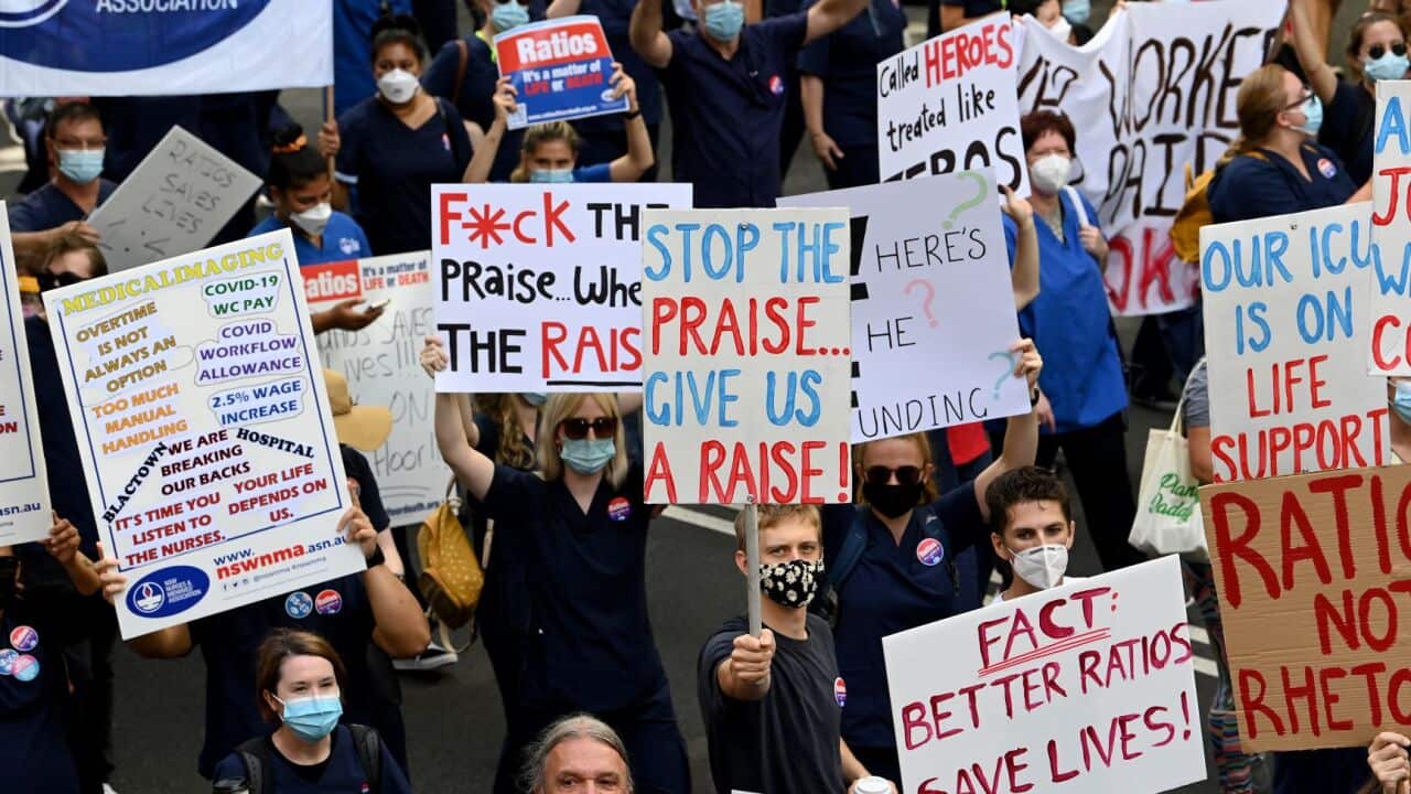 NSW nurses hold placards during a nurses’ strike in Sydney