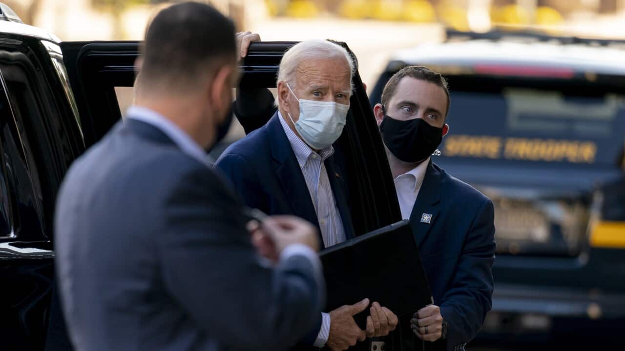 Democratic presidential candidate former Joe Biden arrives at the Queen Theater for virtual town hall.