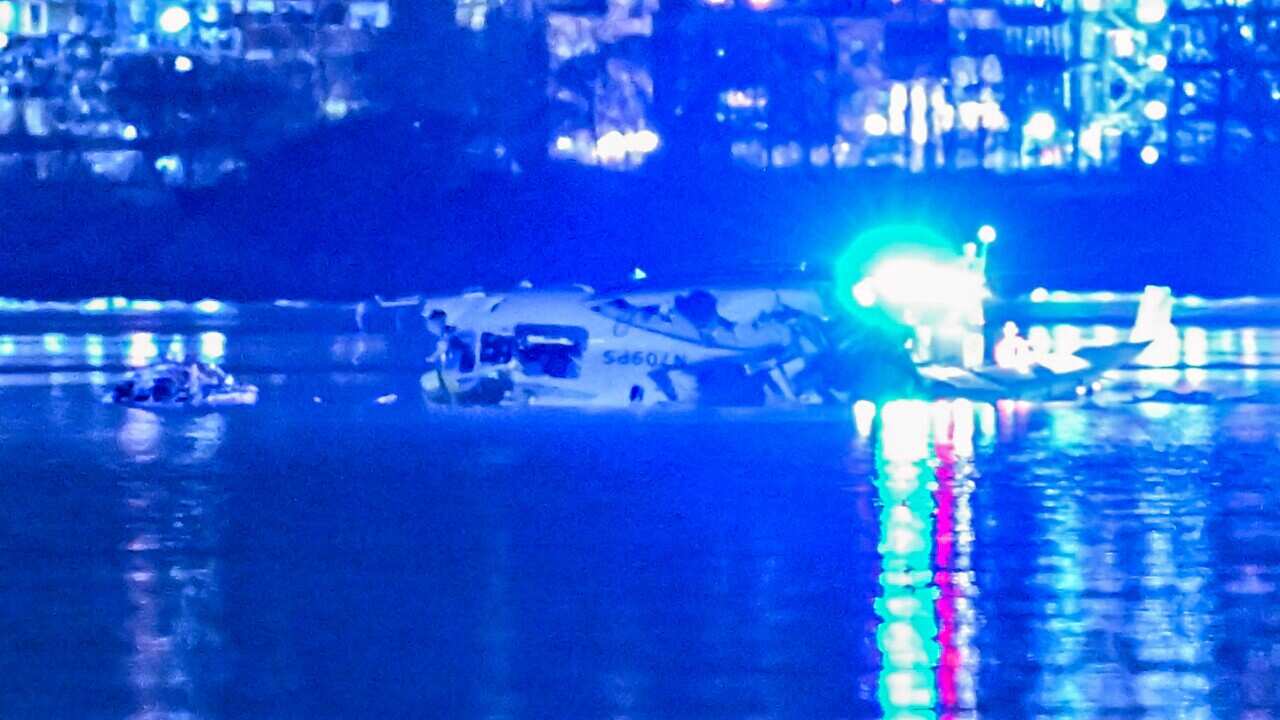 Wreckage of an American Airlines plane in a river
