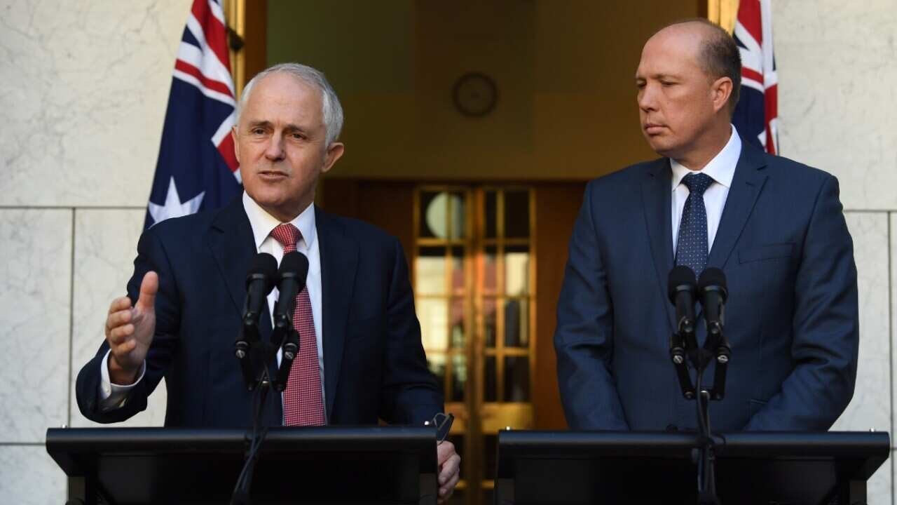 Australian Prime Minister Malcolm Turnbull (left) and Minister for Immigration and Border Protection Peter Dutton speak during a press conference in April 2017
