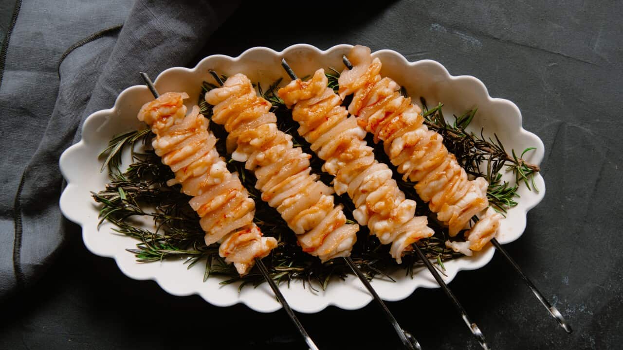 Tiger prawn and lardo skewers with smoked rosemary