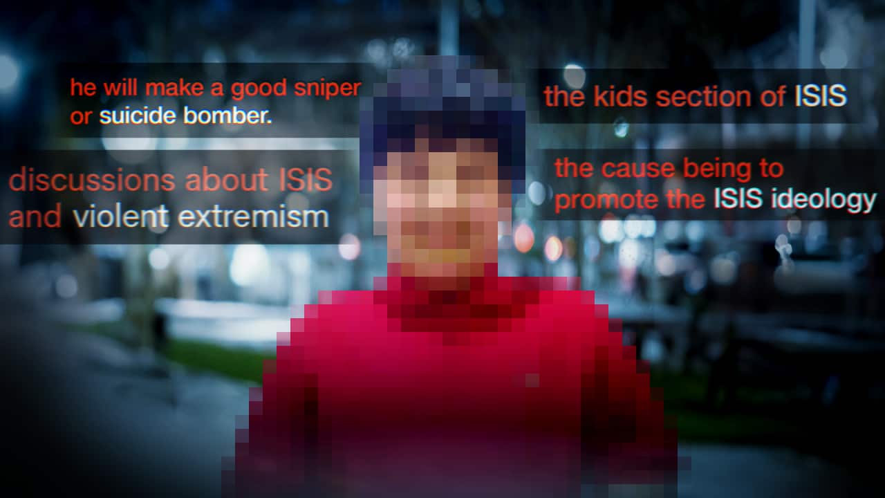 A pixelated picture of a young boy surrounded by text.