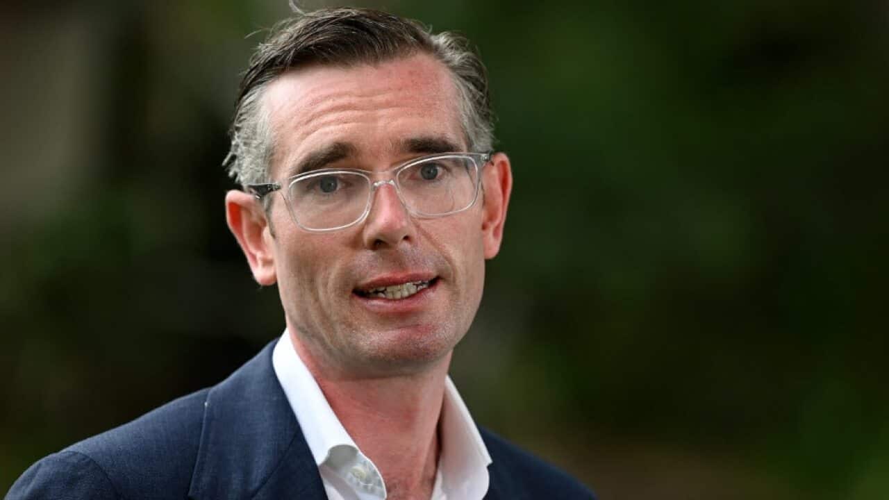 NSW Premier Dominic Perrottet speaks to the media during a press conference in Sydney, Sunday, 13 February, 2022.