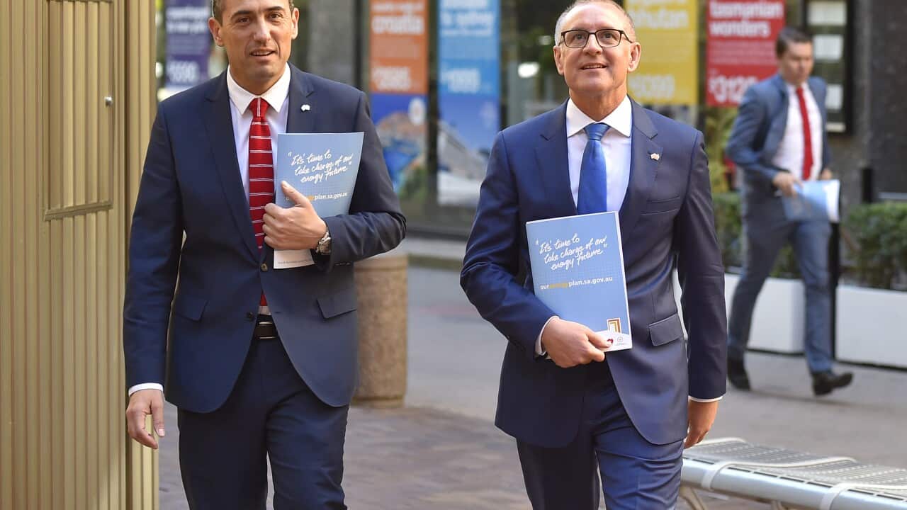 South Australian Premier Jay Weatherill MP (R) and Energy Minister Tom Koutsantonis arrive at the energy plan conference in Adelaide