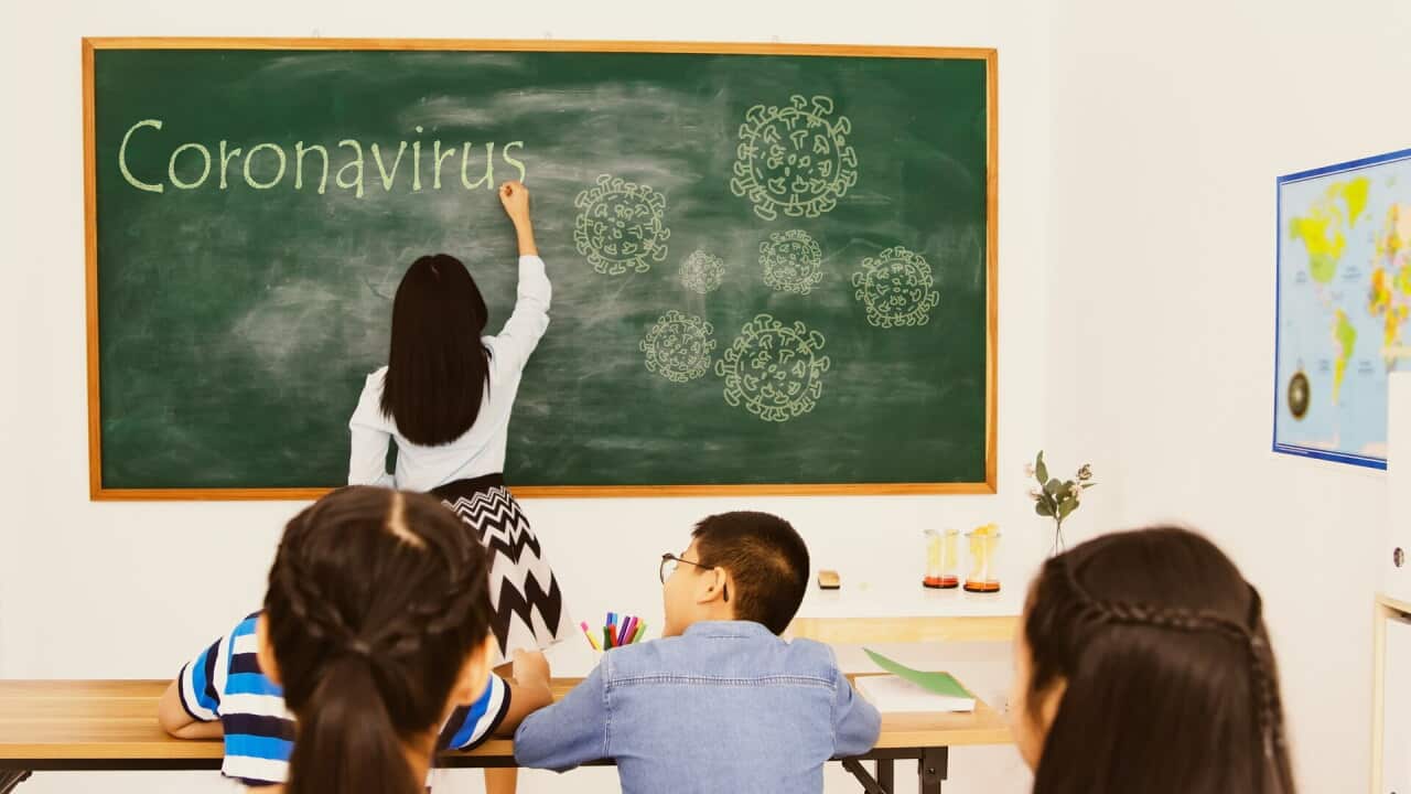 Students in classroom learning about coronavirus