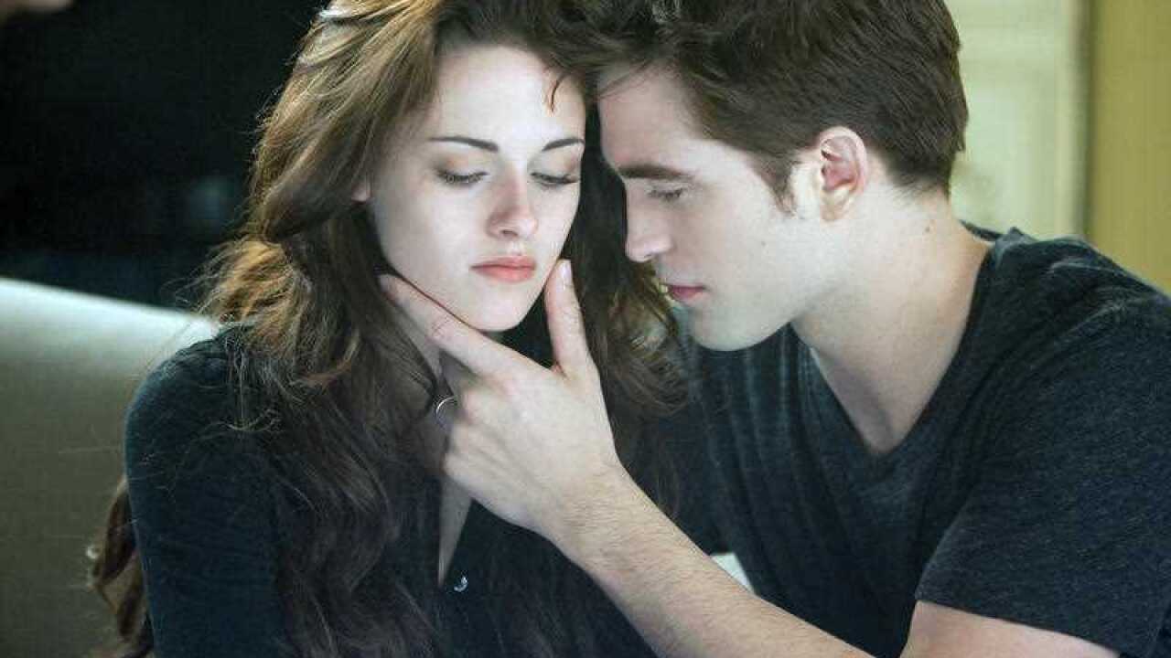 This film image released by Summit Entertainment shows Kristen Stewart, left, and Robert Pattinson in a scene from "The Twilight Saga: Breaking Dawn Part 2." (AP Photo/Summit Entertainment, Andrew Cooper)