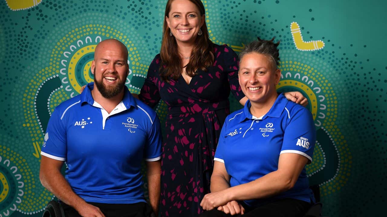 Australian Paralympic athletes Ryley Batt and Danni Di Toro pose for a photograph with Chef de Mission Kate Mcloughlin.