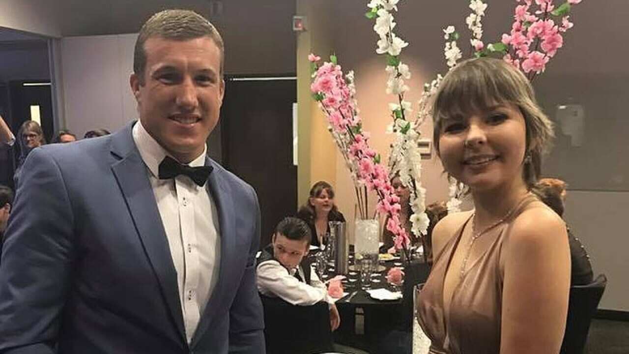 Newcastle Knights player Trent Hodkinson with teenager Hannah Rye