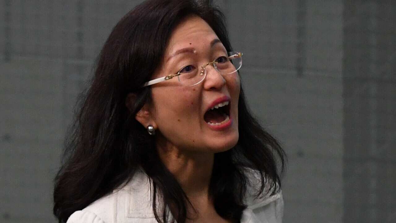 Liberal MP Gladys Liu reacts during Question Time at Parliament
