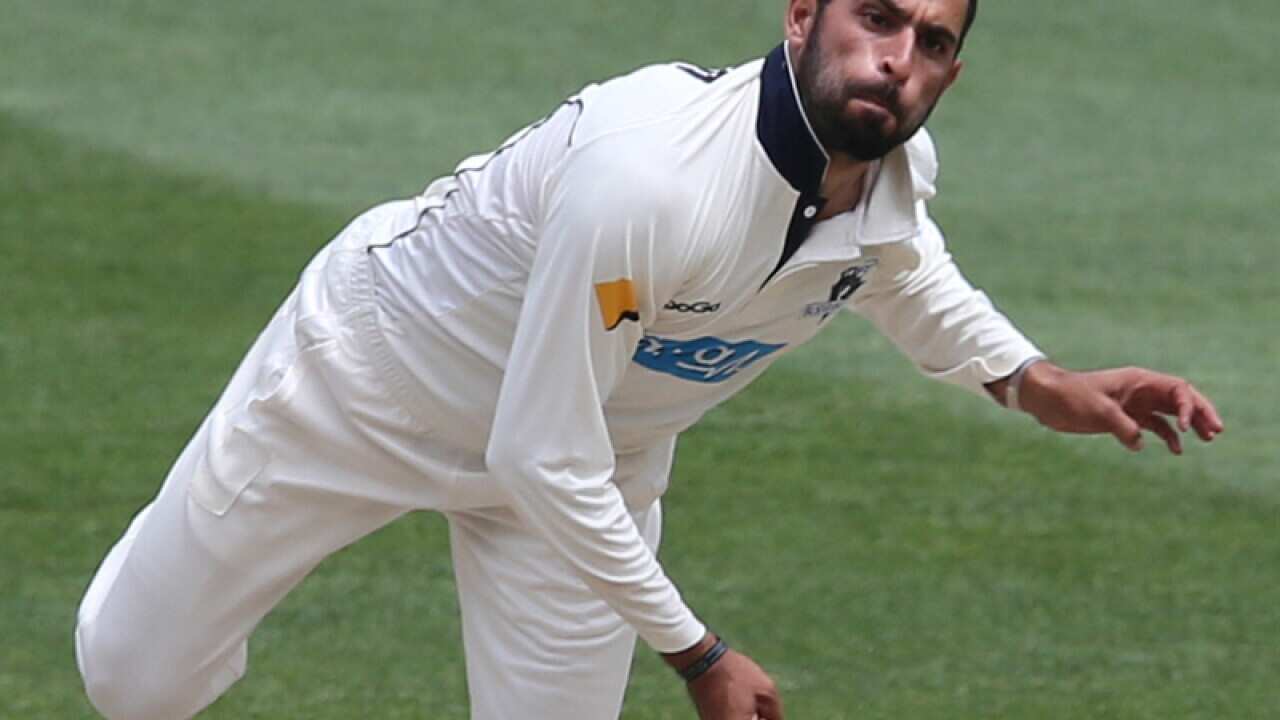 Fawad Ahmed bowling for the Bushrangers
