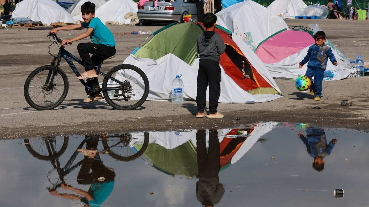 Stranded Tent 'My kids are scared': Melbourne mother stranded in Lebanon pleads for ...