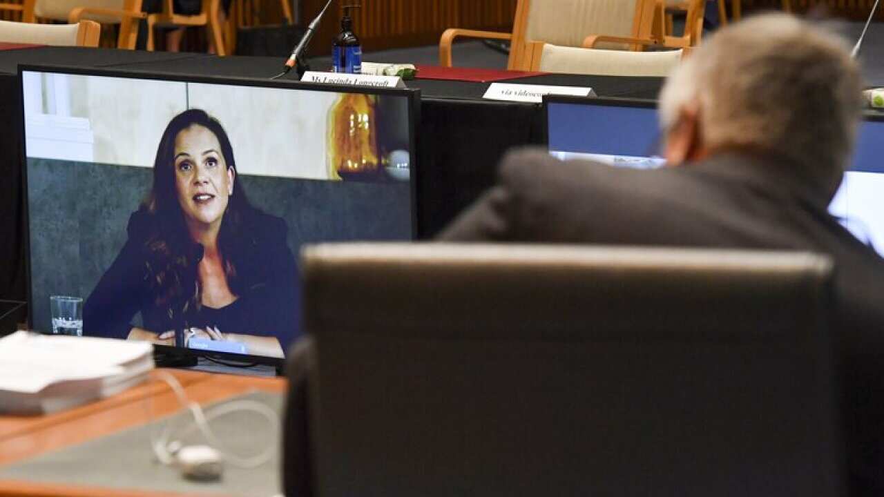 Mel Silva, left, the managing director of Google Australia and New Zealand, appears via a video link during a Senate inquiry into a mandatory code