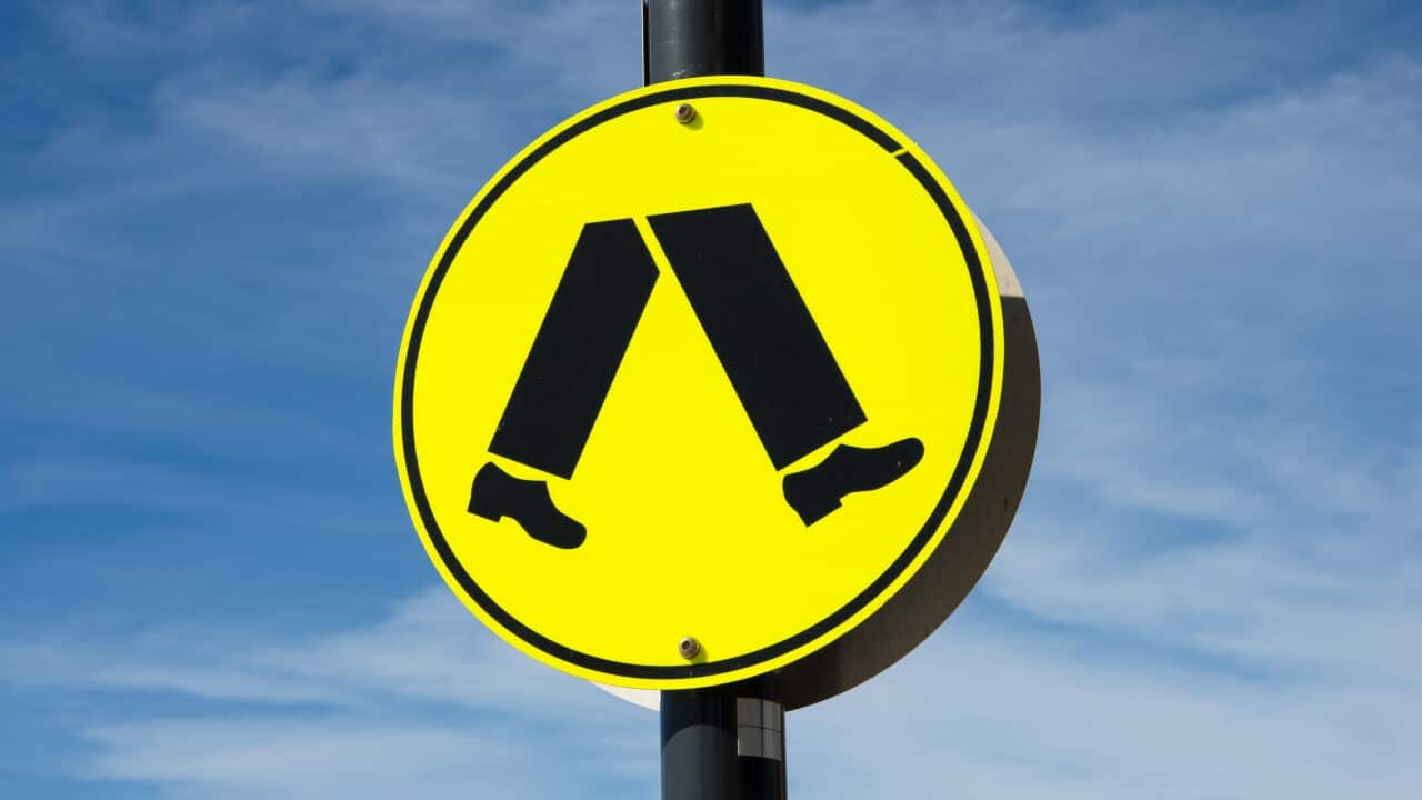 Pedestrian crossing warning sign