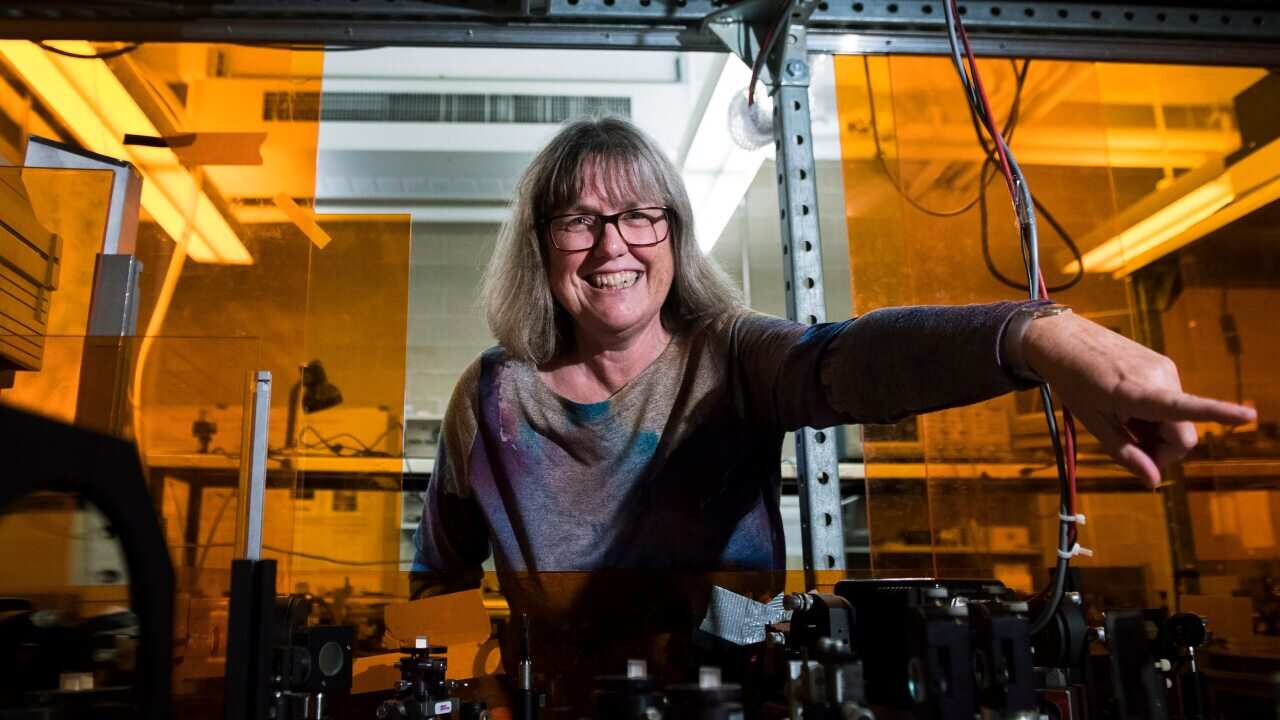 Nobel Prize winner Donna Strickland shows the media her lab