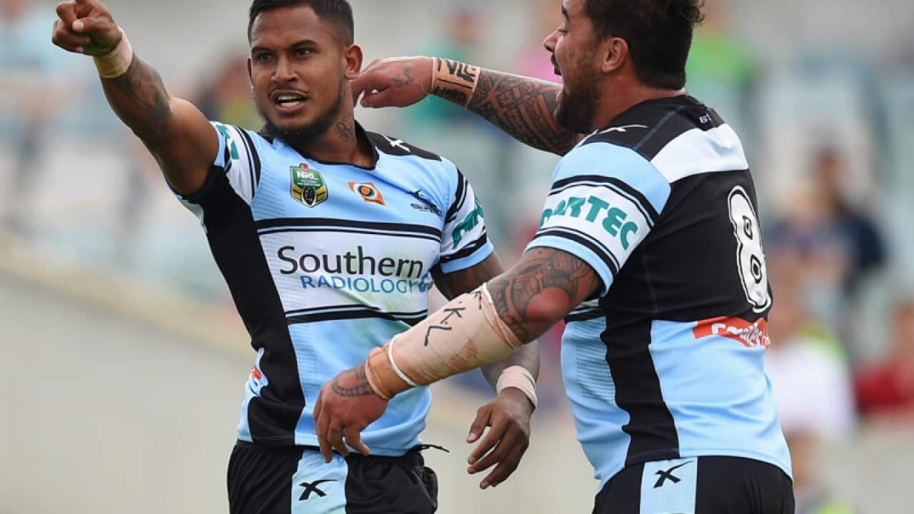 Cronulla Sharks player Ben Barba celebrates after scoring a try