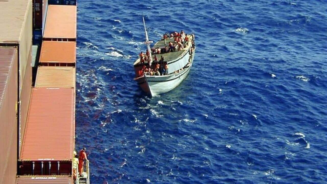 The MV Tampa gets close to the KM Palapa.