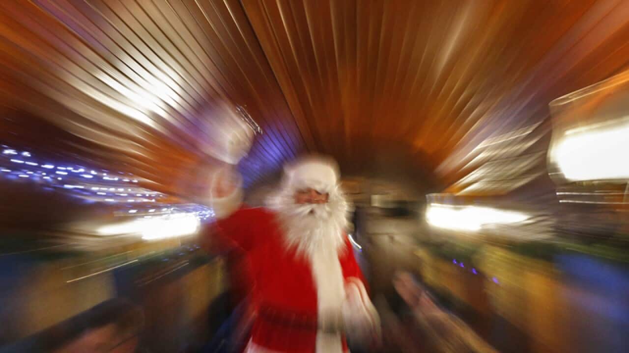A man playing the role of Santa Claus