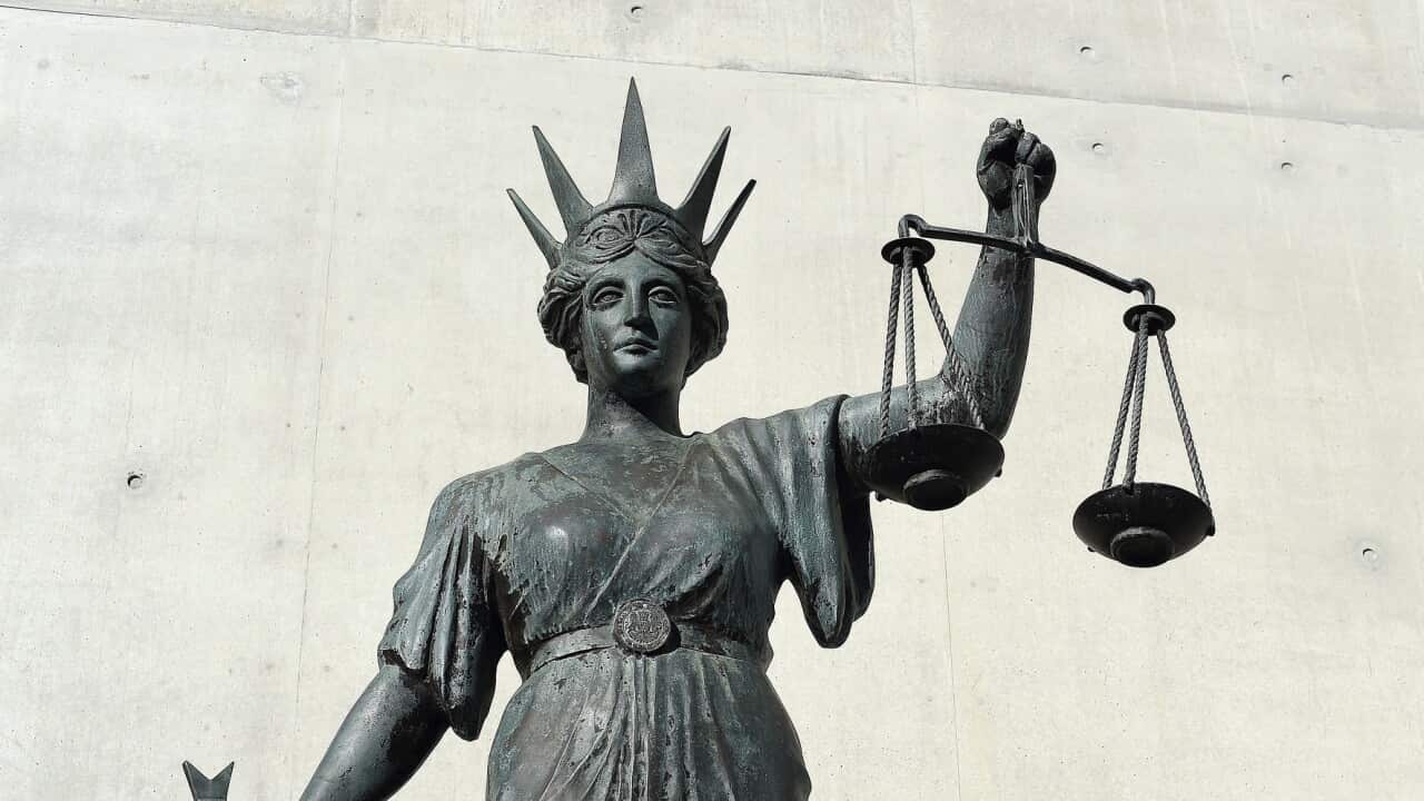 A statue of Themis, the Greek God of Justice