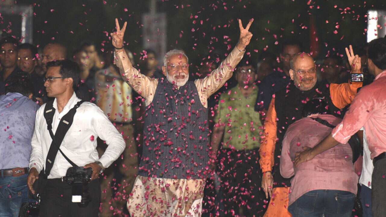 Prime Minister Narendra Modi celebrates