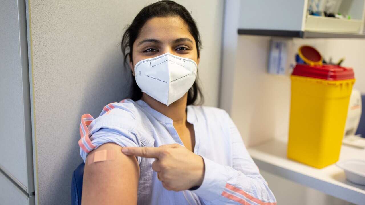 Woman proud to have received vaccine