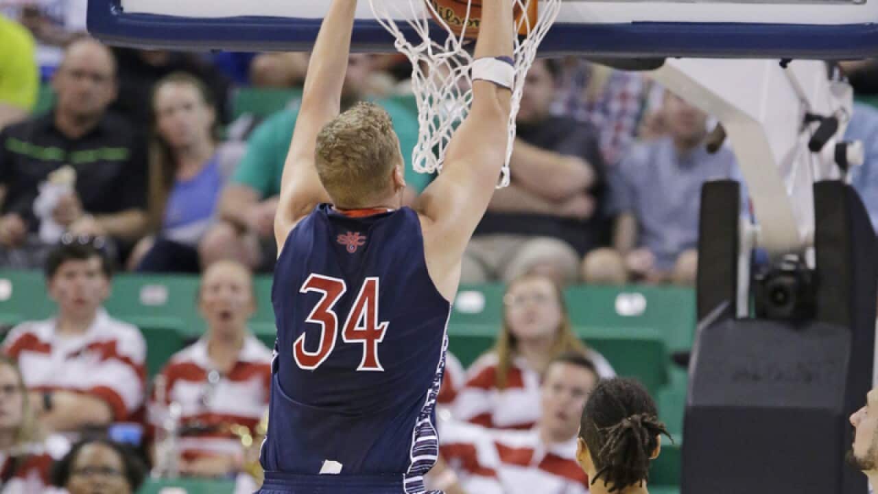 Saint Mary's Jock Landale (34) and Arizona's Keanu Pinder (25)