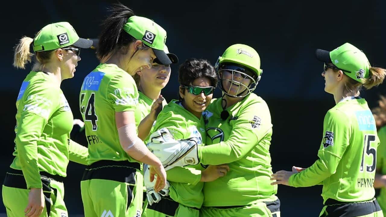 Nida Dar celebrates taking the wicket during the Womens Big Bash League (WBBL) match at North Sydney Oval, Oct 20, 2019. (AAP Image/Joel Carrett)