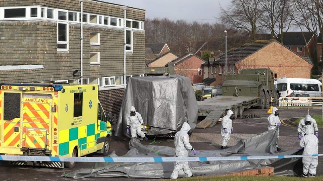 Military personnel in gas masks in Salisbury