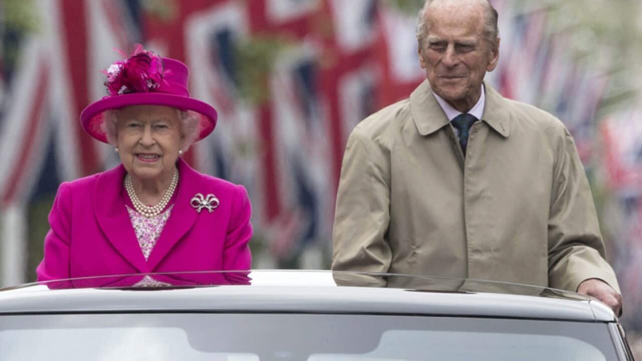 Britain's Queen Elizabeth II (L) and Prince Philip