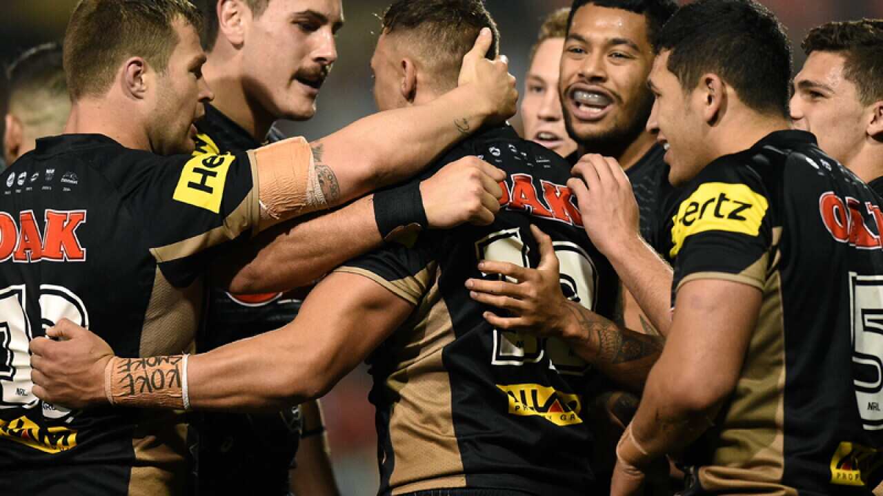 James Fisher-Harris of the Panthers, (C), celebrates with team mates