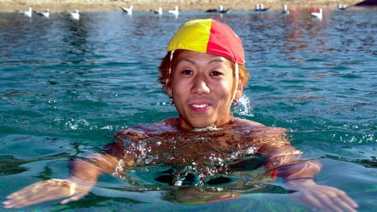 Brisbane, July 24, 2002. Yoshitaka Yamamoto from Japan at Southbank beach in Brisbane. He is here to learn about water safety. (AAP Image/Simon Renilson) NO ARCHIVING
