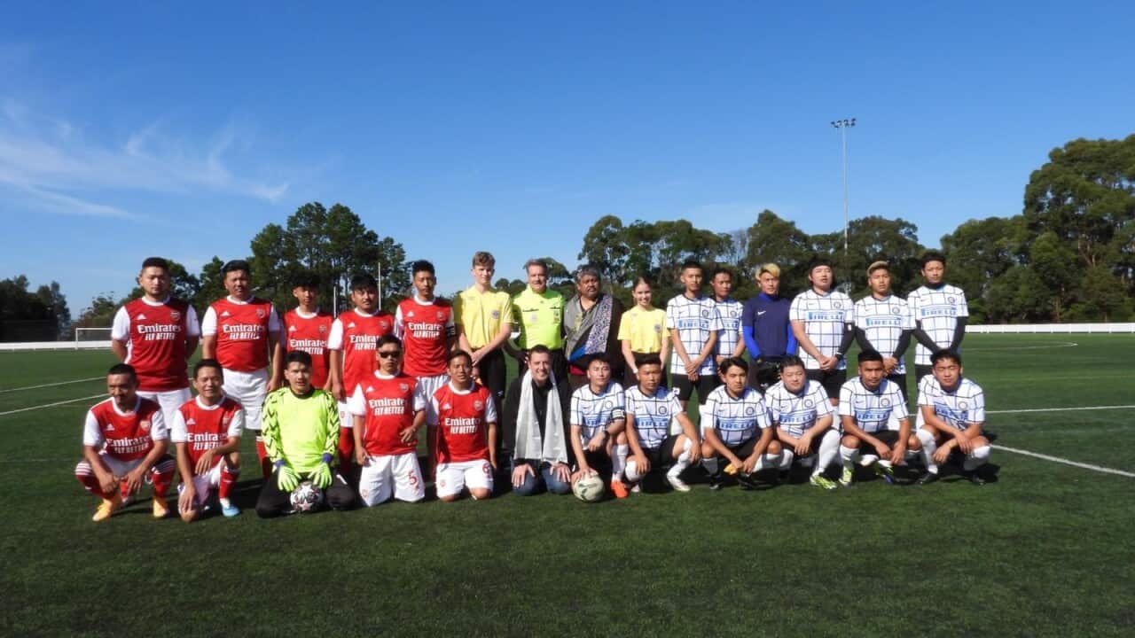 Soccer teams with Northern Beaches Council Mayor, Michael Regan at opening ceremony