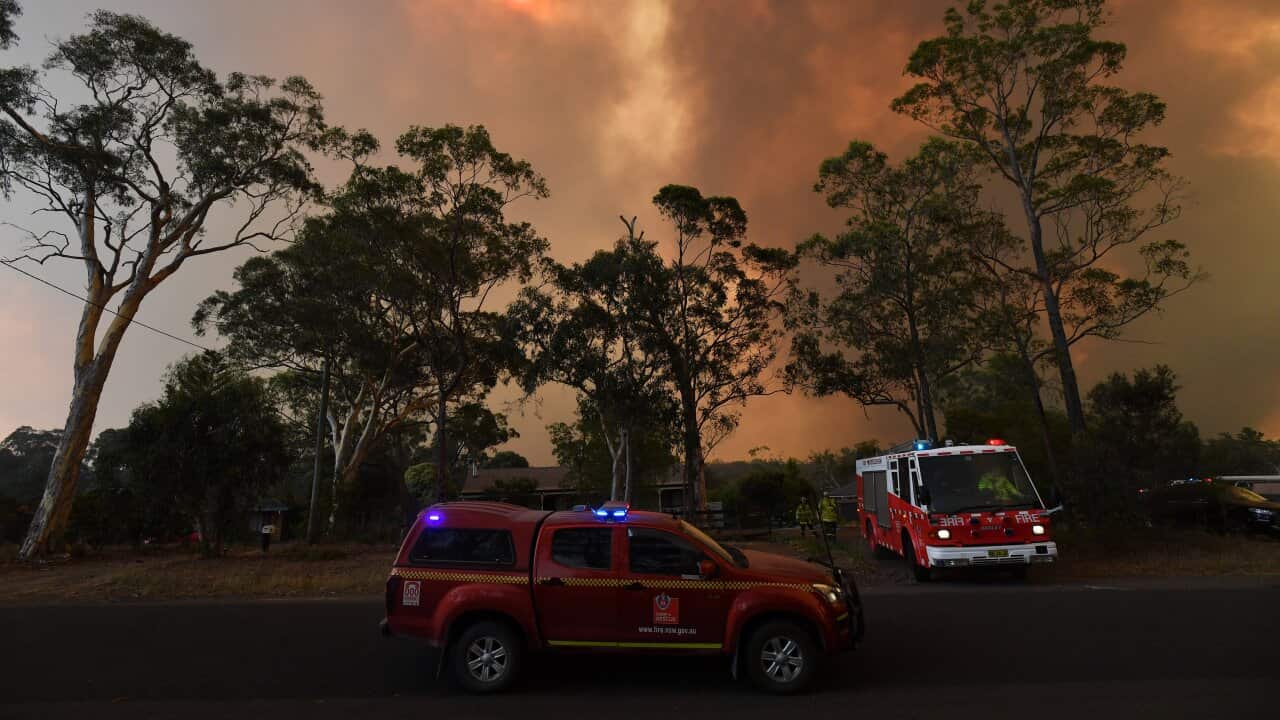 NSW Rural Fire Service crews prepare for the Green Wattle Creek Fire as it threatens homes.