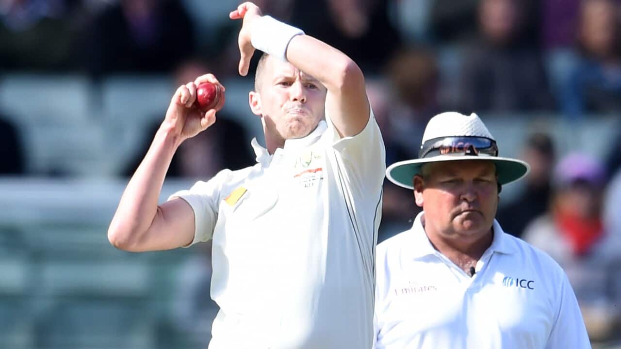 Australia's Peter Siddle bowls during the second day of the second Test match between Australia and the West Indies at the MCG in Melbourne