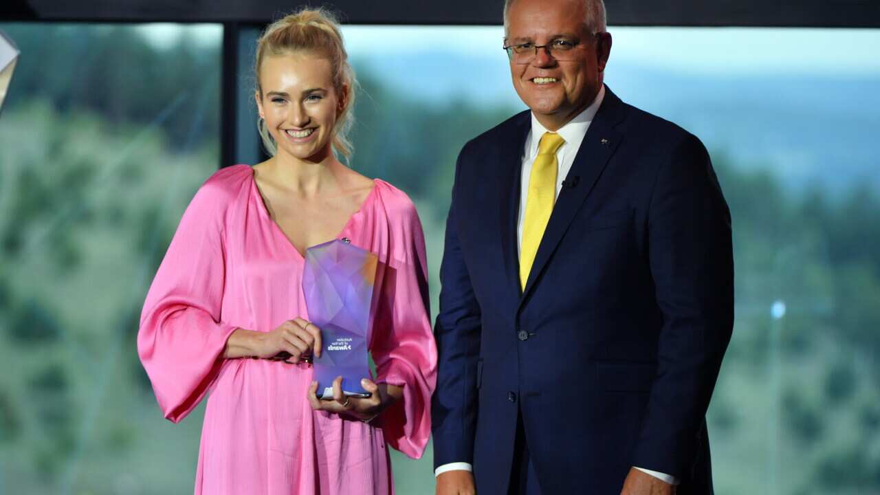 Prime Minister Scott Morrison with 2021 Young Australian of the Year winner Isobel Marshall during the 2021 Australian of the Year Awards at the National Arboretum in Canberra, Monday, January 25, 2021. (AAP Image/Mick Tsikas) NO ARCHIVING
