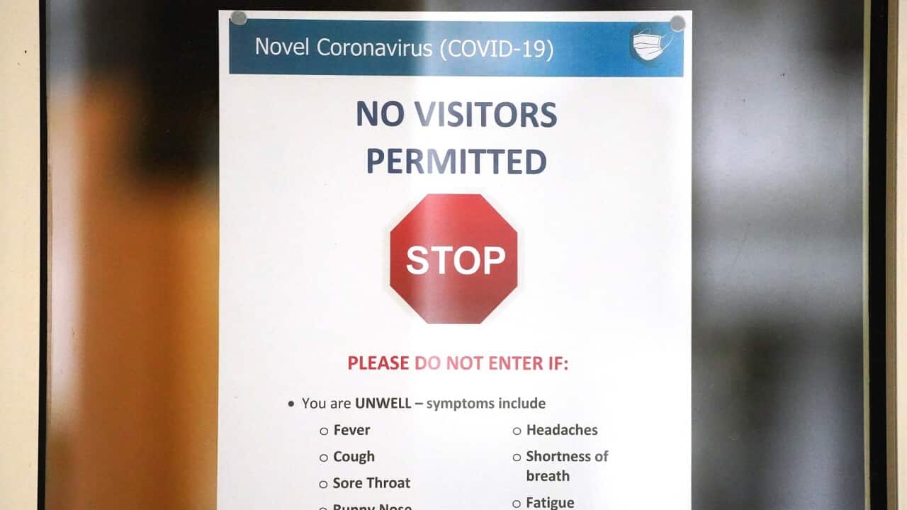 A sign is seen on the window of the Albert Road Clinic in Melbourne