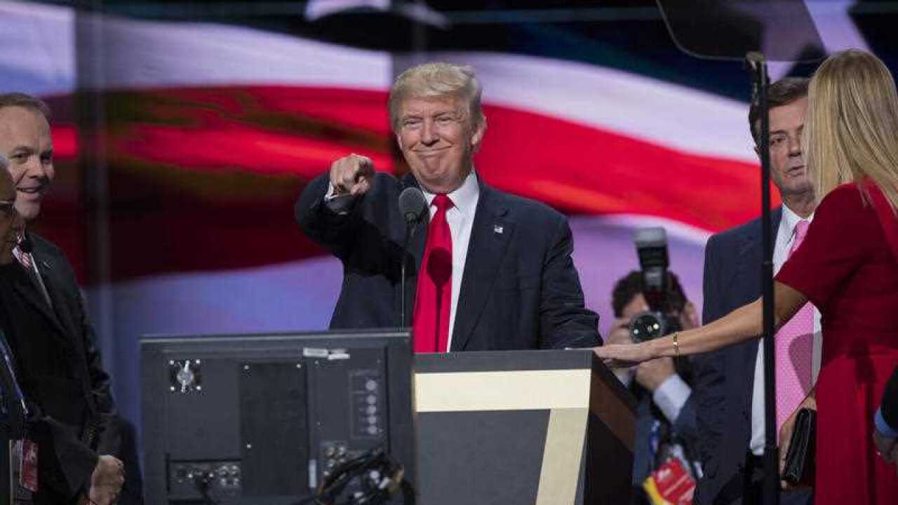 Then-Republican presidential candidate Donald Trump, his daughter Ivanka Trump, right, then-campaign manager Paul Manafort, and Rick Gates, left, on stage during a walk through at the Republican National Convention, Thursday, July 21, 2016, in Cleveland.