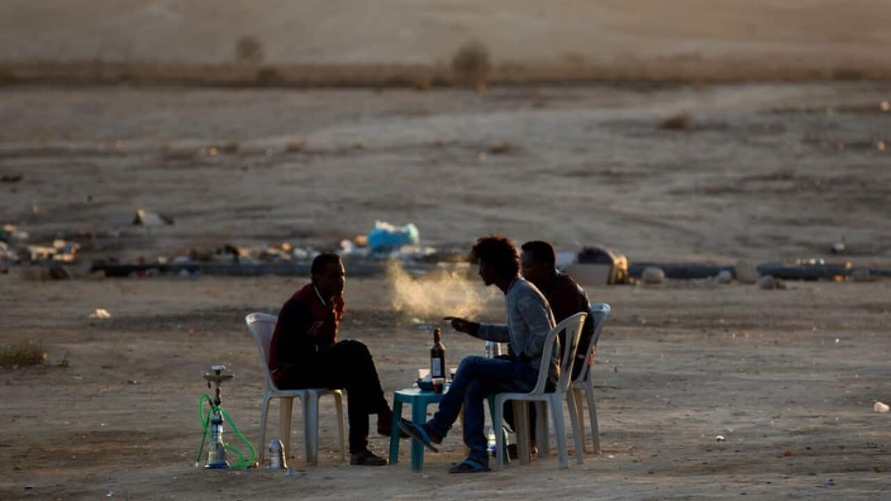 Eritrean refugees at a makeshift cafe outside the Holot detention facility in the Negev Desert, along Israel's border with Egypt