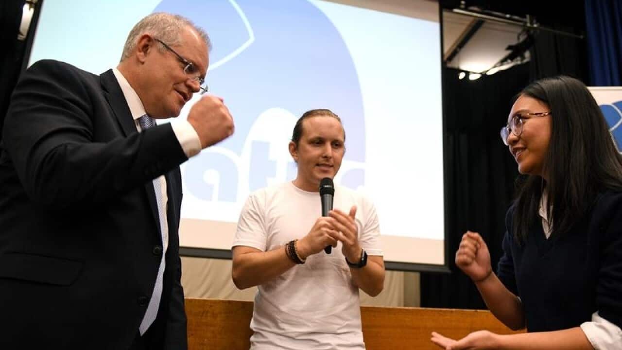 Prime Minister Scott Morrison with students in Sydney.