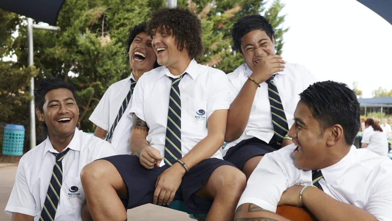 Lilley, centre, pictured in brownface depicting Tongan character Jonah Takalua.