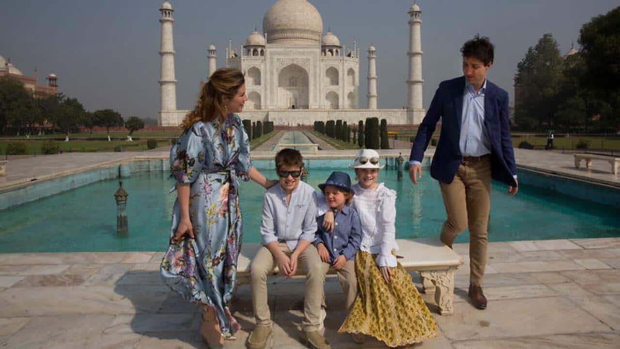 Canadian Prime Minister Justin Trudeau, his wife, Sophie Gregoire Trudeau, their sons Hadrien and Xavier, daughter Ella-Gracepose to pose in front of Taj Mahal