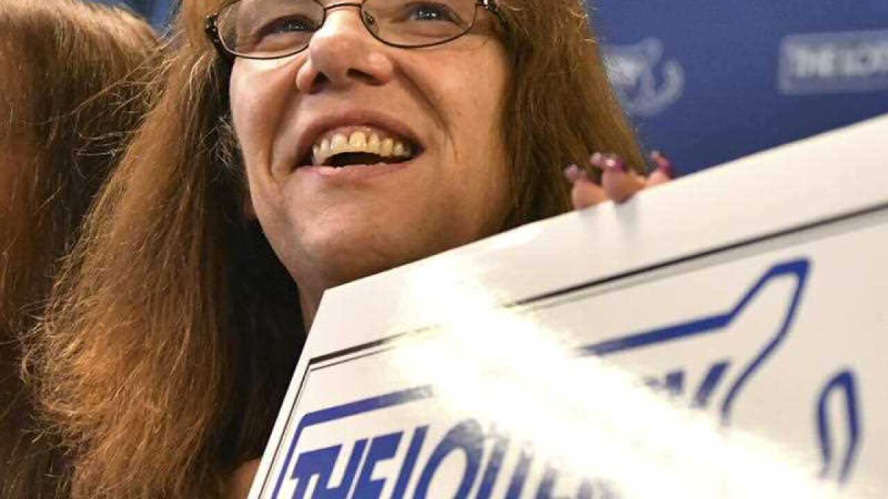 Mavis Wanczyk, of Chicopee, Mass., smiles during a news conference where she claimed the $758.7 million Powerball prize
