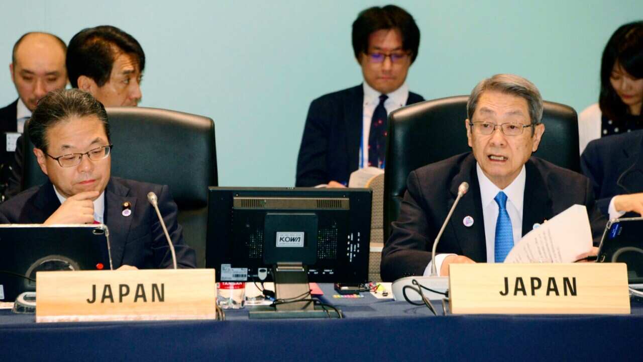 Japan's Foreign Minister Taro Kono, right, and Hiroshige Seko, left, Economy, Trade and Industry Minister attend a session during the G20 ministerial meeting.